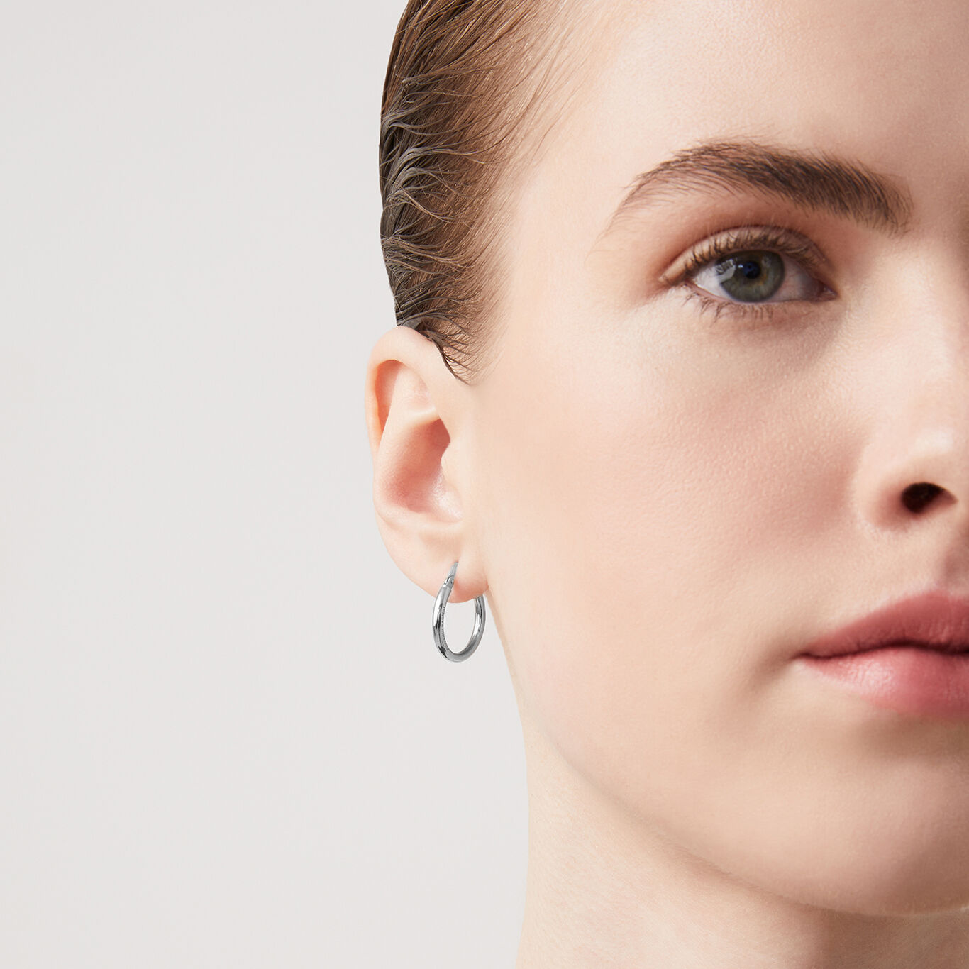 Essential Light Small Earrings, Hoop earrings in Sterling Silver_image number 1_Giovanni Raspini