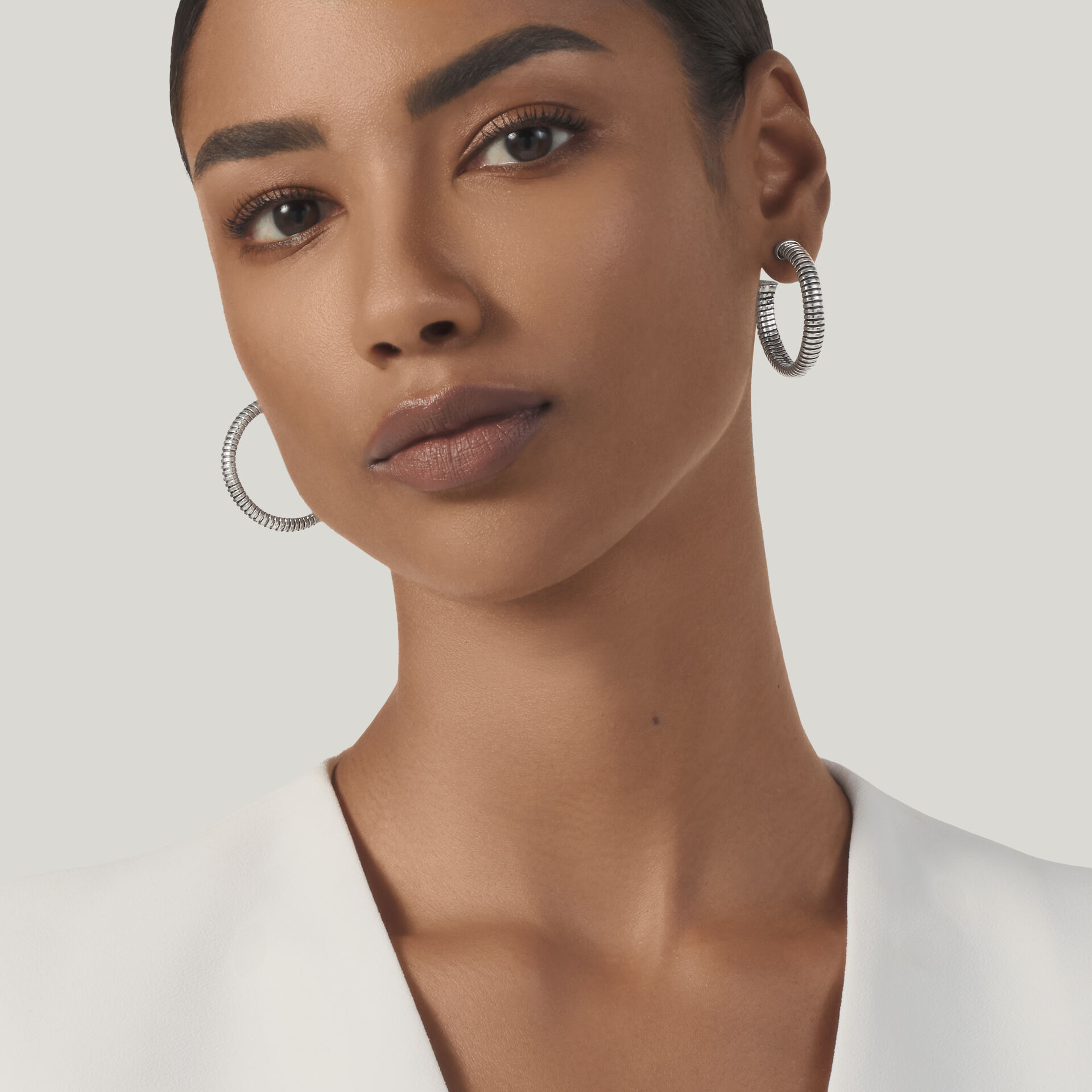 Tubogas Big Hoop Earrings image number 1