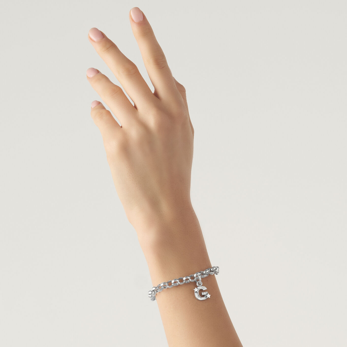 Charm »G« mit Sternen