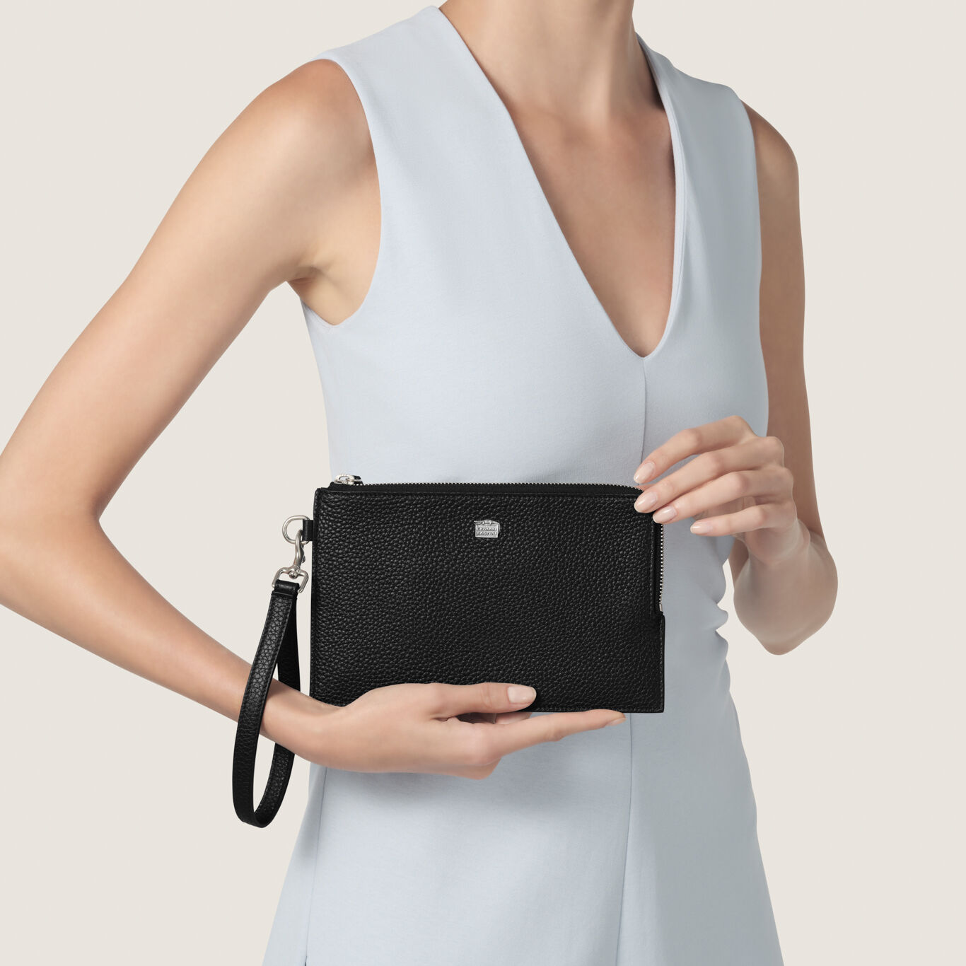 Embossed Leather Pouch, Leather pouch with iconic sterling silver decoration_image number 1_Giovanni Raspini